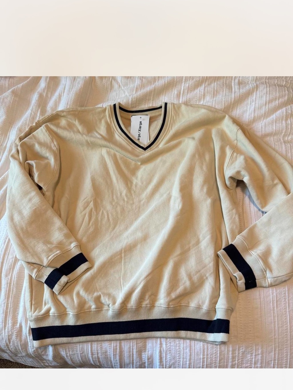 Brandy Melville Cream V‑Neck Sweater with Navy Trim